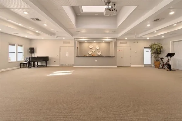 a view of a room with stainless steel appliances