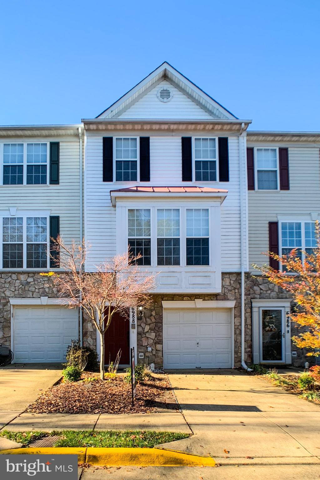 6988 Cromarty Drive Alexandria, VA 22315 - Photo 1 of 62 a view of a building with a swimming pool