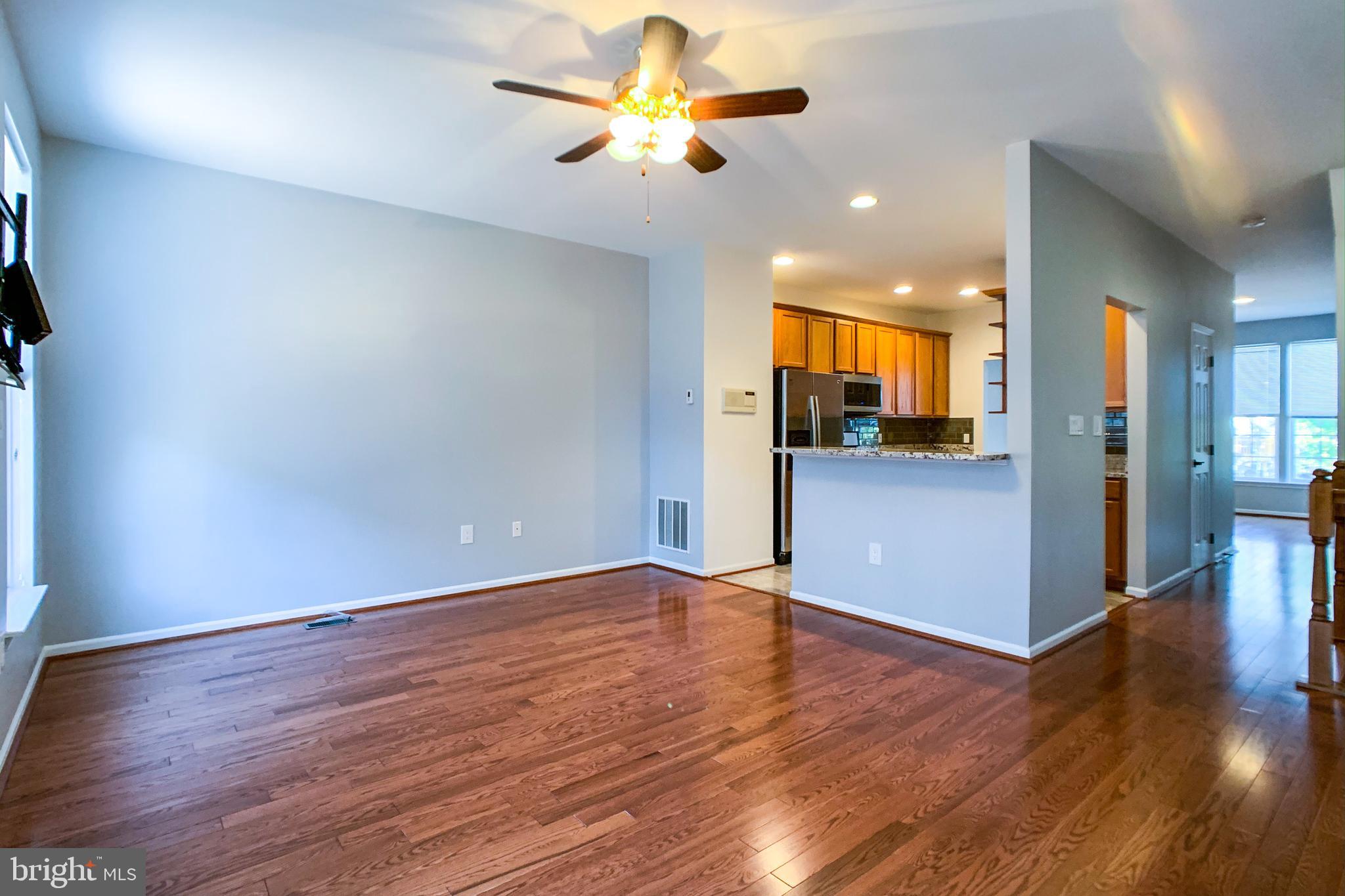 6988 Cromarty Drive Alexandria, VA 22315 - Photo 21 of 62 a view of a kitchen with wooden floor and a kitchen