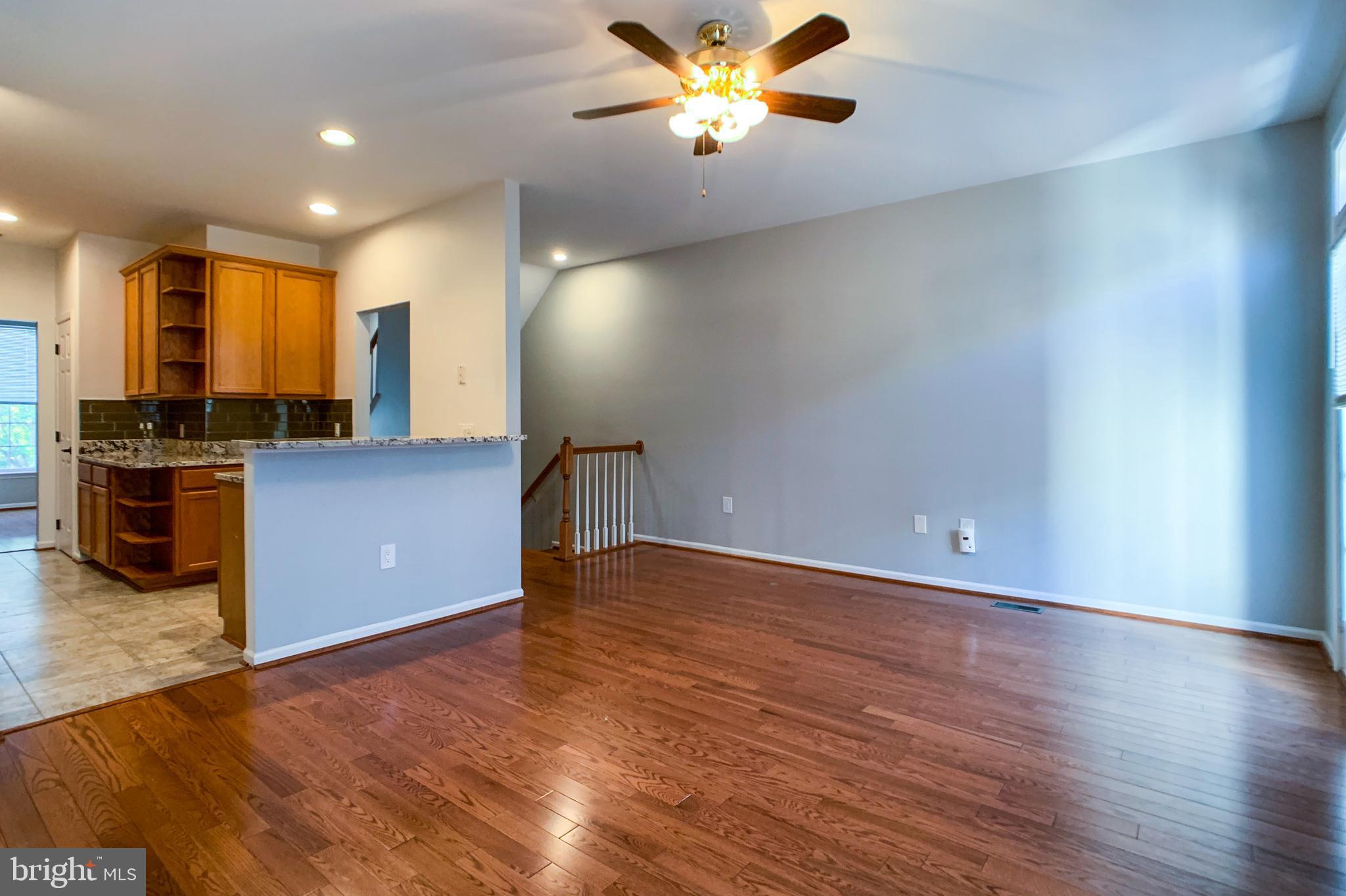6988 Cromarty Drive Alexandria, VA 22315 - Photo 23 of 62 a view of a kitchen with a sink and a refrigerator