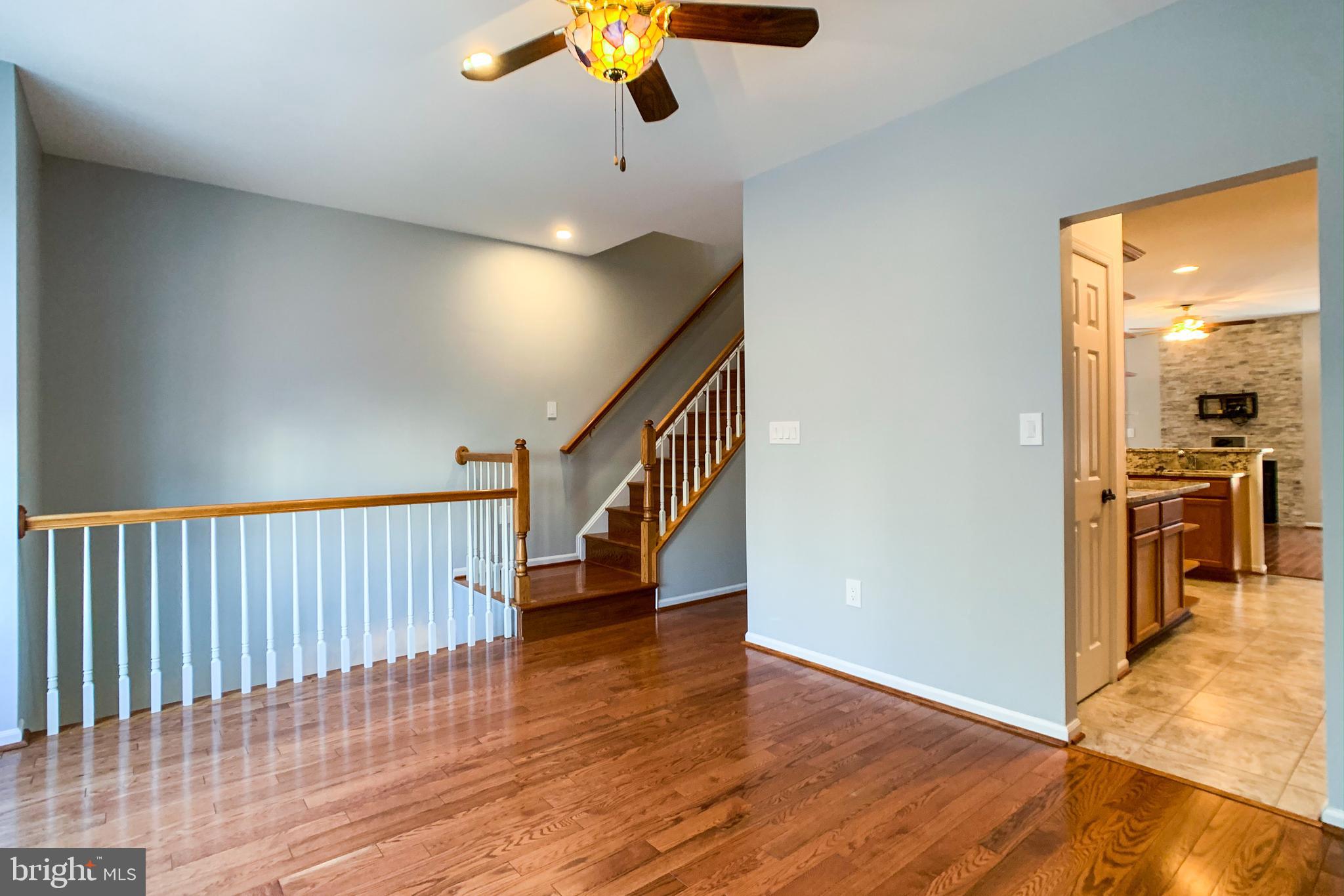 6988 Cromarty Drive Alexandria, VA 22315 - Photo 32 of 62 a view of an entryway with wooden floor
