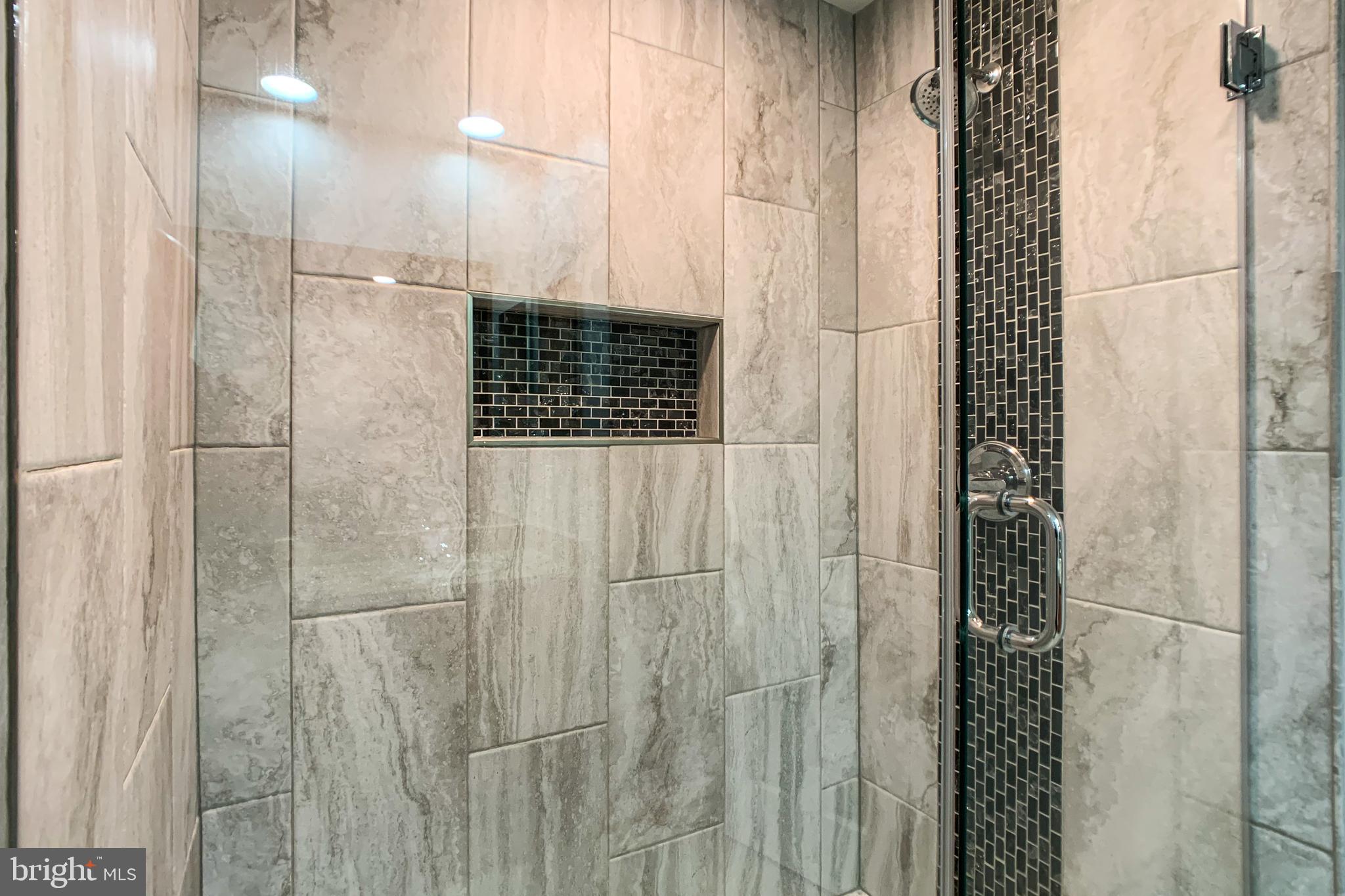 6988 Cromarty Drive Alexandria, VA 22315 - Photo 42 of 62 a bathroom with a shower