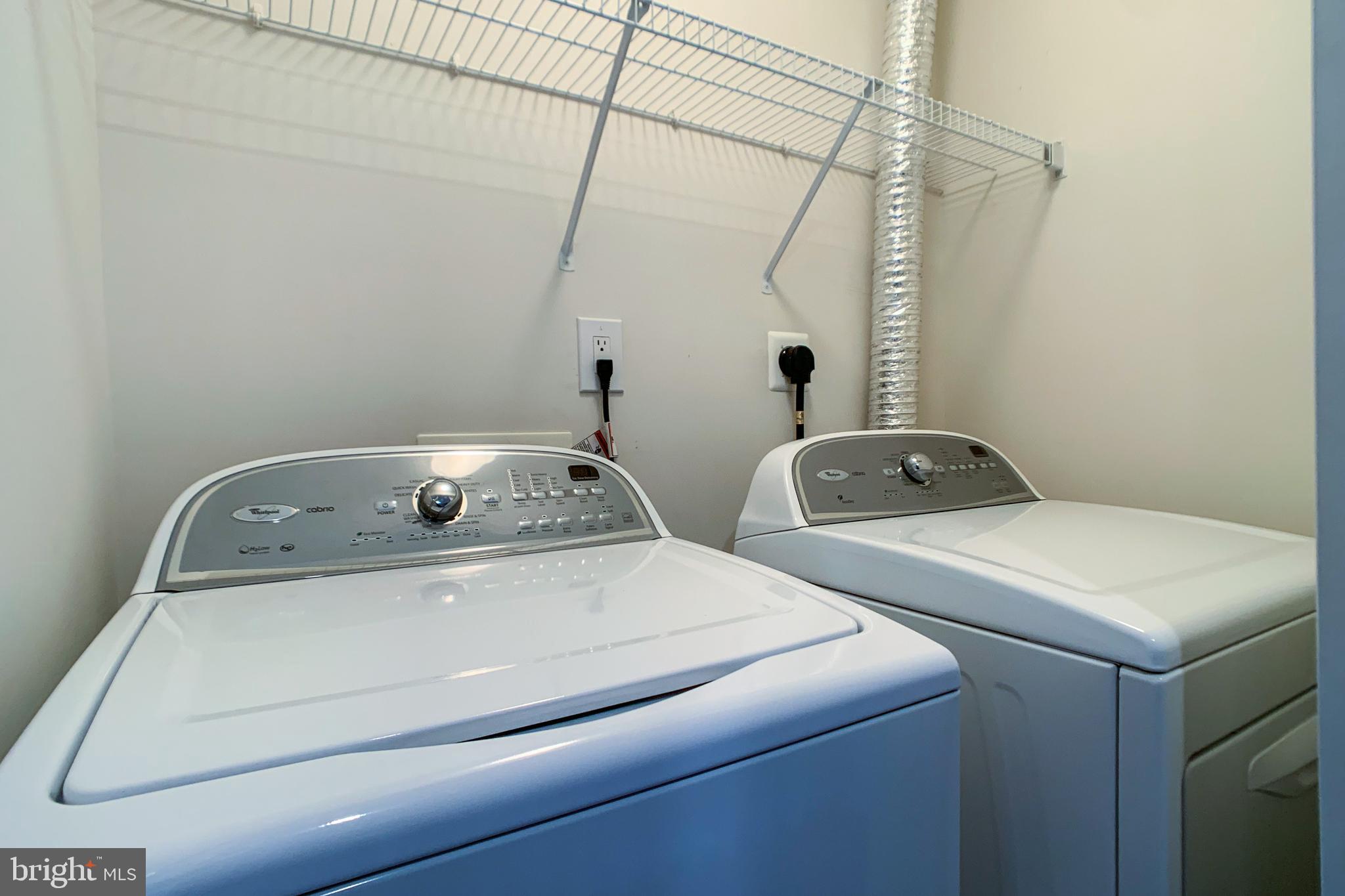 6988 Cromarty Drive Alexandria, VA 22315 - Photo 52 of 62 a utility room with dryer and washer