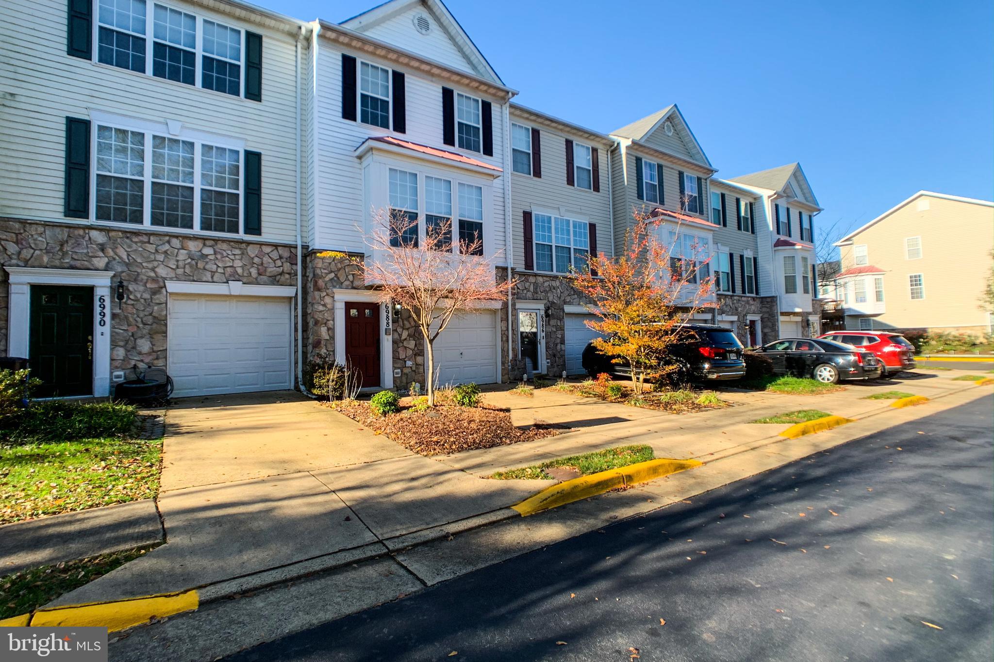 6988 Cromarty Drive Alexandria, VA 22315 - Photo 8 of 62 a view of an house with backyard and swimming pool