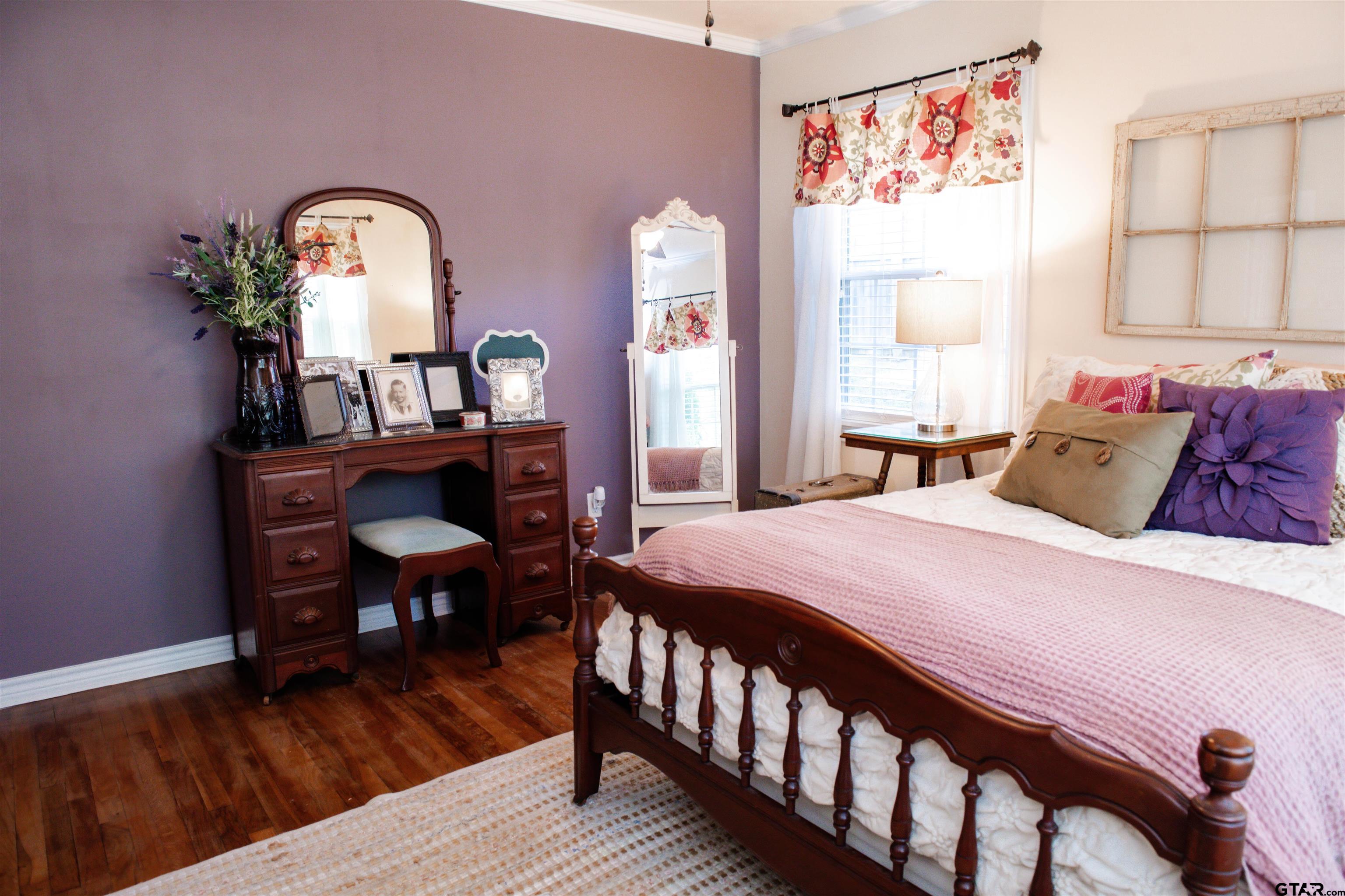 265 Hatchett Street Rusk, TX 75785 - Photo 8 of 17 a bedroom with a bed a dresser and window