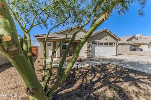 a house with trees in front of it