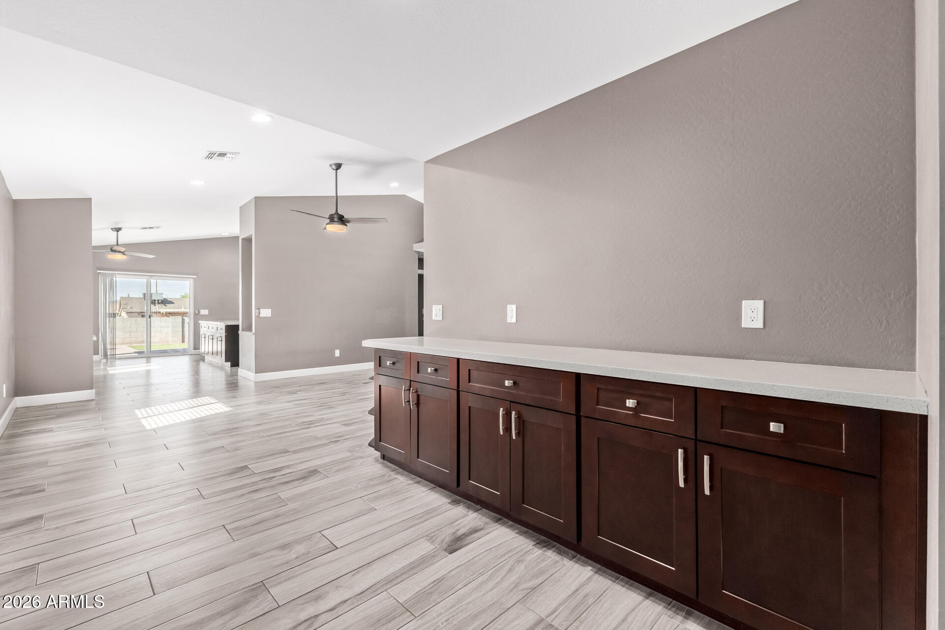 2730 East Broadway Road Phoenix, AZ 85040 - Photo 7 of 36 Entry to living to kitchen