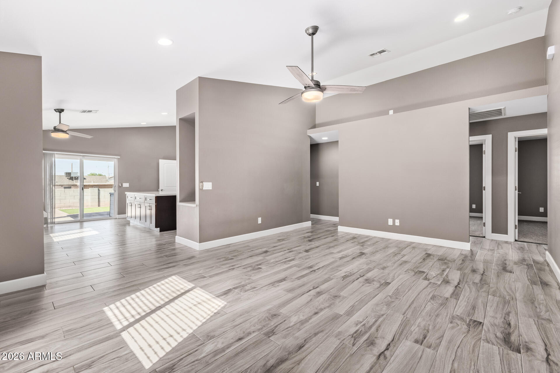 2730 East Broadway Road Phoenix, AZ 85040 - Photo 10 of 36 Living to kitchen to slider