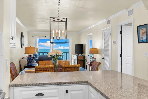 a view of living room and dining room