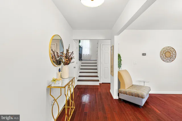 a view of a livingroom with furniture and wooden floor