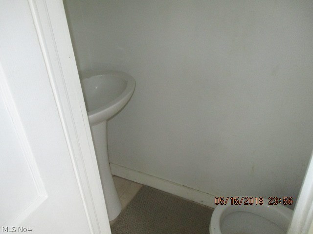 6211 Wayland Road Ravenna, OH 44266 - Photo 12 of 13 Half Bath in the Kitchen
