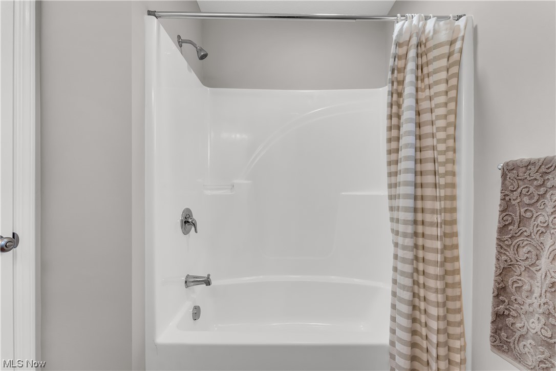 7501 Southland Road Mentor, OH 44060 - Photo 21 of 21 Bathroom with shower / bath combo with shower curtain
