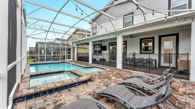 a living room with furniture or outdoor view and a large window