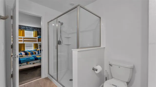 a bathroom with a double vanity sink and mirror