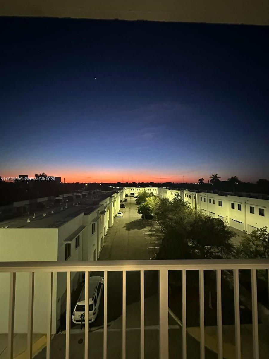 2651 Northeast 212th Terrace, Unit 400 Miami, FL 33180 - Photo 5 of 8 a view of a balcony with an ocean