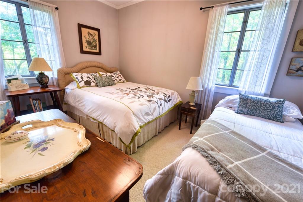 528 Wilderness Road Tryon, NC 28782 - Photo 21 of 29 a bedroom with two beds and a window