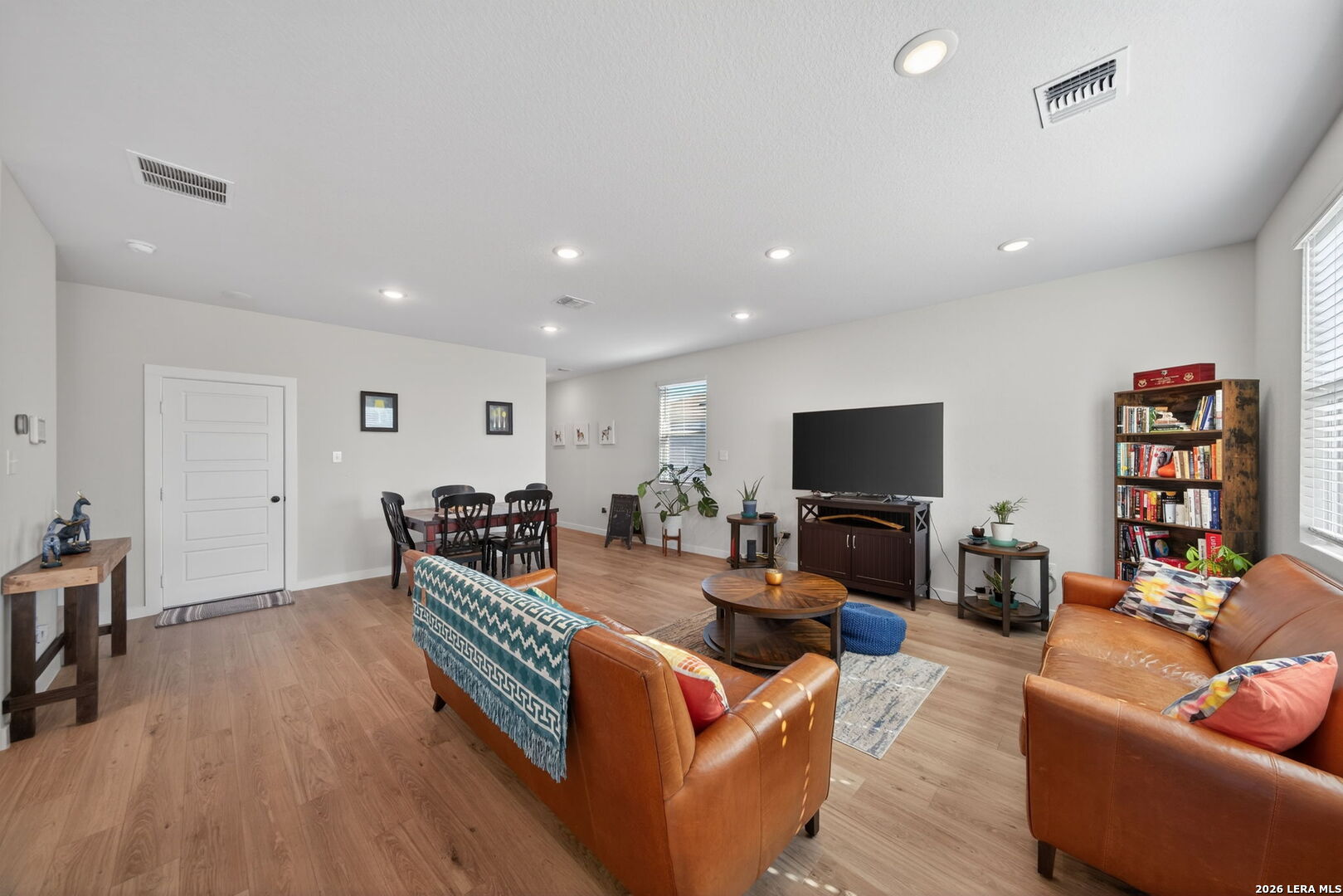 4238 Danforth Street New Braunfels, TX 78130 - Photo 4 of 21 a living room with furniture and a flat screen tv