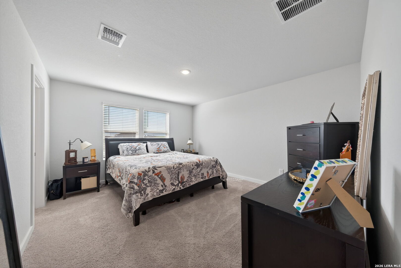 4238 Danforth Street New Braunfels, TX 78130 - Photo 10 of 21 a bedroom with a bed and a tv