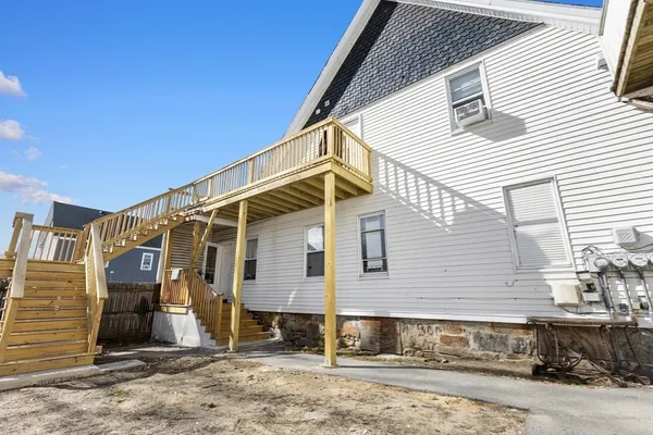 a front view of a house with yard