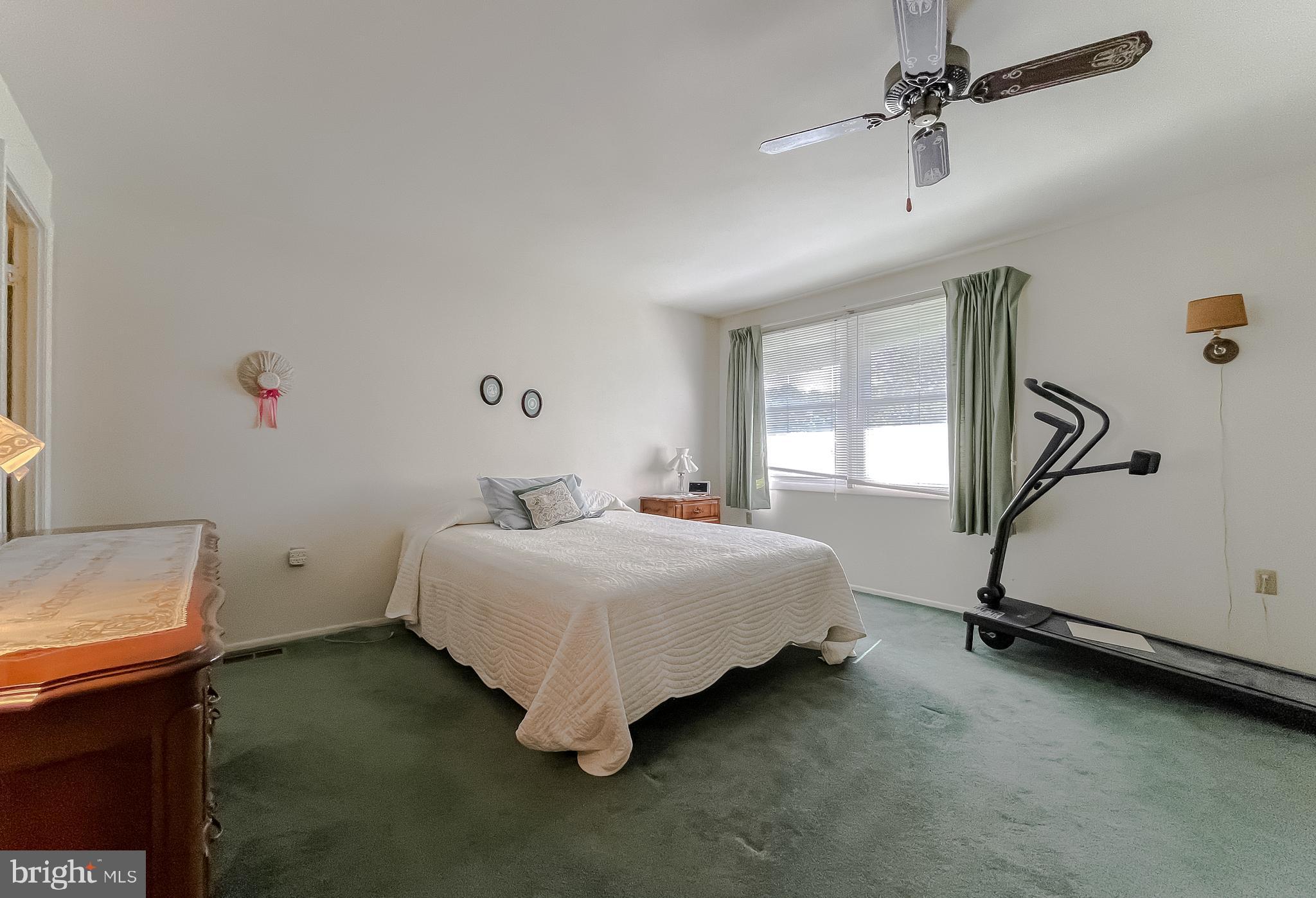 2422 Pinefield Road Waldorf, MD 20601 - Photo 15 of 43 a bedroom with a bed and window