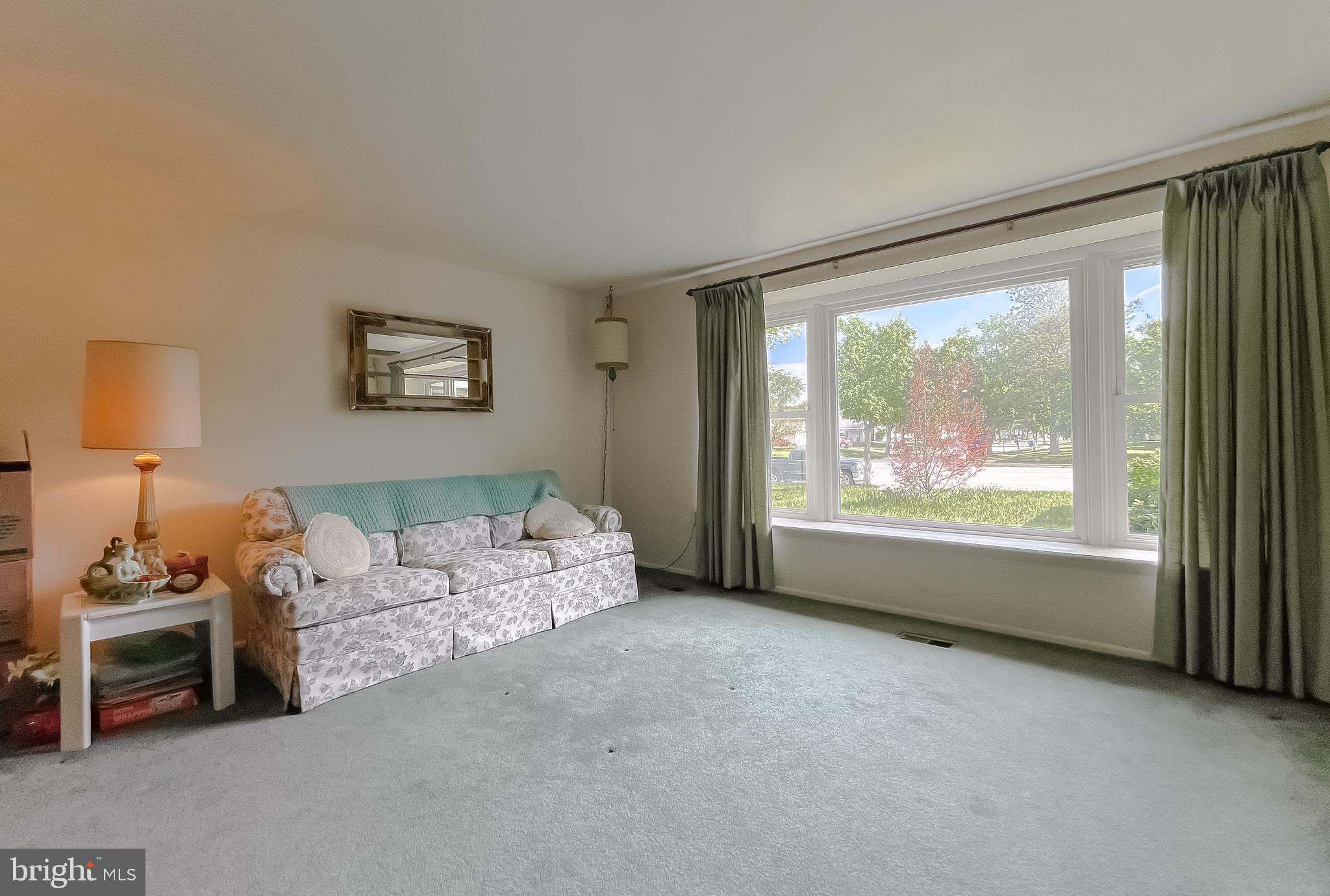2422 Pinefield Road Waldorf, MD 20601 - Photo 4 of 43 a living room with furniture and a large window