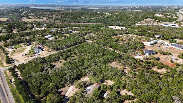 an aerial view of town with residential houses with outdoor space
