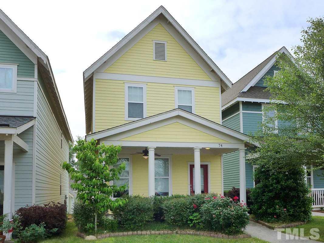 74 Owen Towne Road Chapel Hill, NC 27516 - Photo 1 of 27 a front view of a house with garden