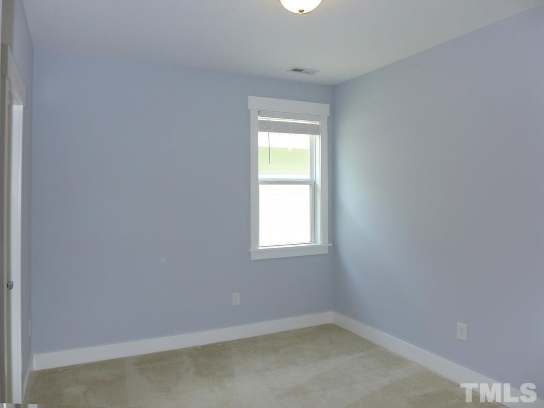 74 Owen Towne Road Chapel Hill, NC 27516 - Photo 13 of 27 an empty room with a window