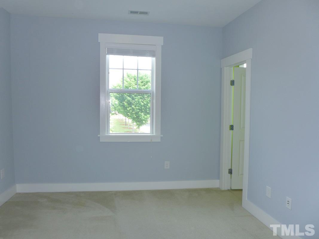 74 Owen Towne Road Chapel Hill, NC 27516 - Photo 14 of 27 an empty room with a window