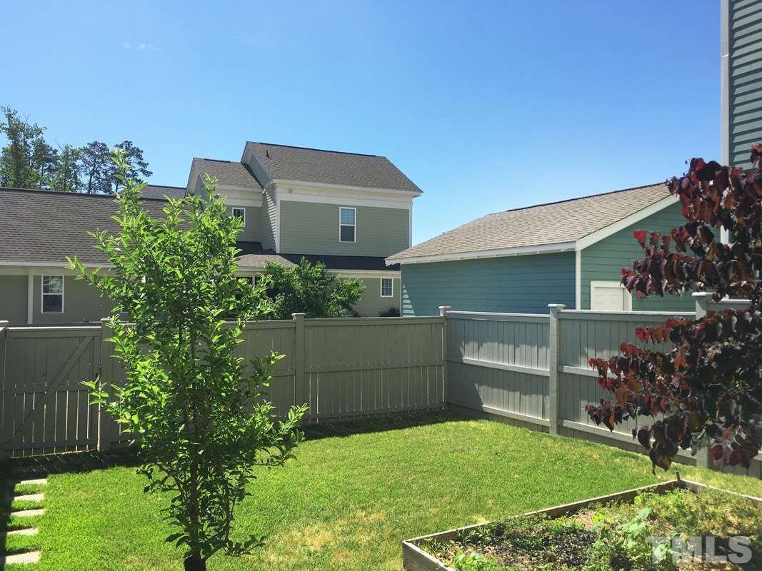 74 Owen Towne Road Chapel Hill, NC 27516 - Photo 17 of 27 a front view of a house with a yard