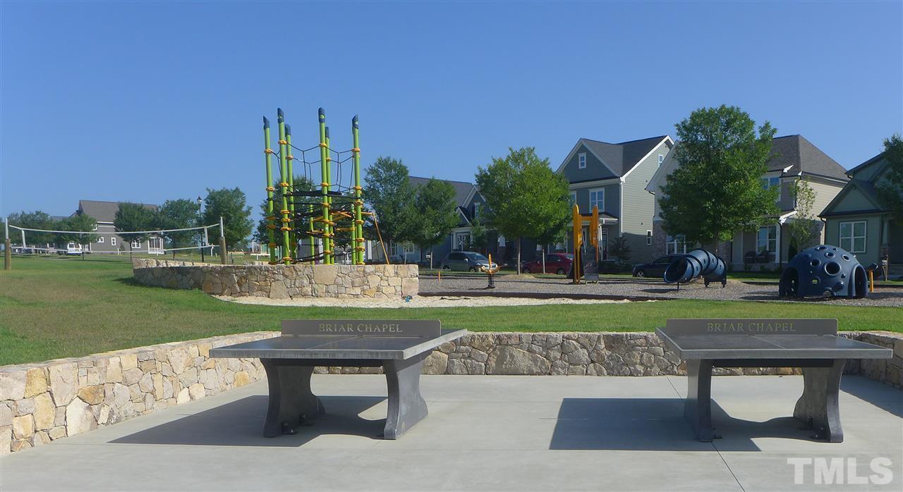 74 Owen Towne Road Chapel Hill, NC 27516 - Photo 25 of 27 a swimming pool with outdoor seating and yard