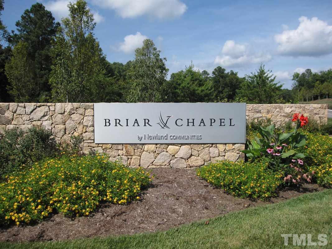 74 Owen Towne Road Chapel Hill, NC 27516 - Photo 27 of 27 a sign on the side of the road