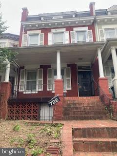 722 Shepherd Street Northwest Washington, DC 20011 - Photo 1 of 25 Charming red brick home with inviting porch.