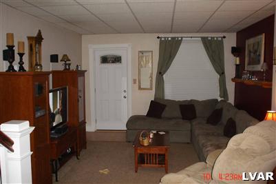 1450 High Street Bethlehem, PA 18018 - Photo 4 of 9 a living room with furniture and a flat screen tv