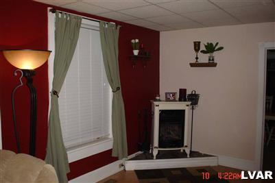 1450 High Street Bethlehem, PA 18018 - Photo 5 of 9 a living room with furniture and a fireplace