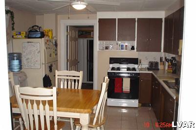1450 High Street Bethlehem, PA 18018 - Photo 6 of 9 a kitchen with a stove and a refrigerator