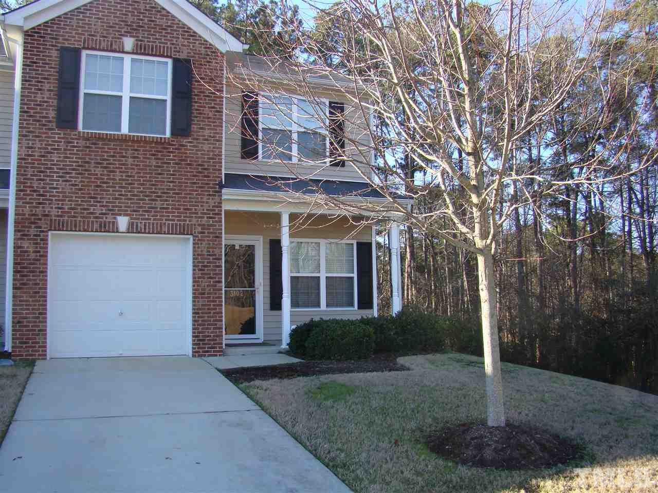 3102 Binghampton Lane Raleigh, NC 27604 - Photo 1 of 13 a view of a brick house with a yard