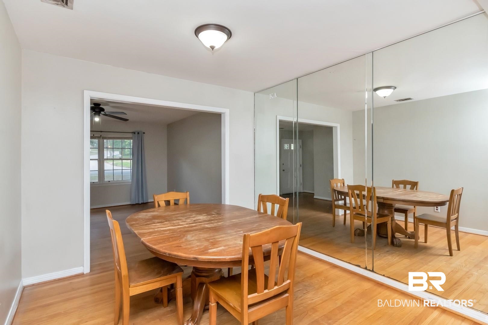 320 Vanderbilt Drive Mobile, AL 36608 - Photo 11 of 39 Dining room featuring light hardwood / wood-style floors and ceiling fan