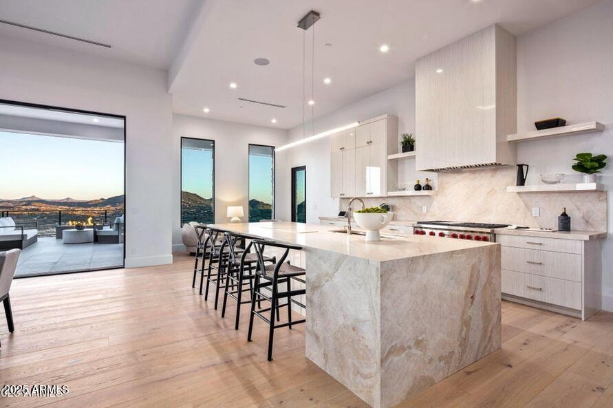 4880 East Lone Mountain Road North Cave Creek, AZ 85331 - Photo 17 of 73 a kitchen with appliances a sink and cabinets