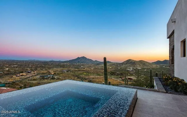 a front view of a building with a yard