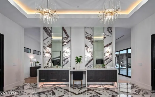 a bathroom with a sink and mirror