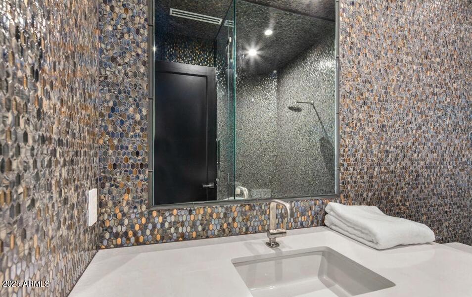 4880 East Lone Mountain Road North Cave Creek, AZ 85331 - Photo 45 of 73 a bathroom with a bathtub and shower