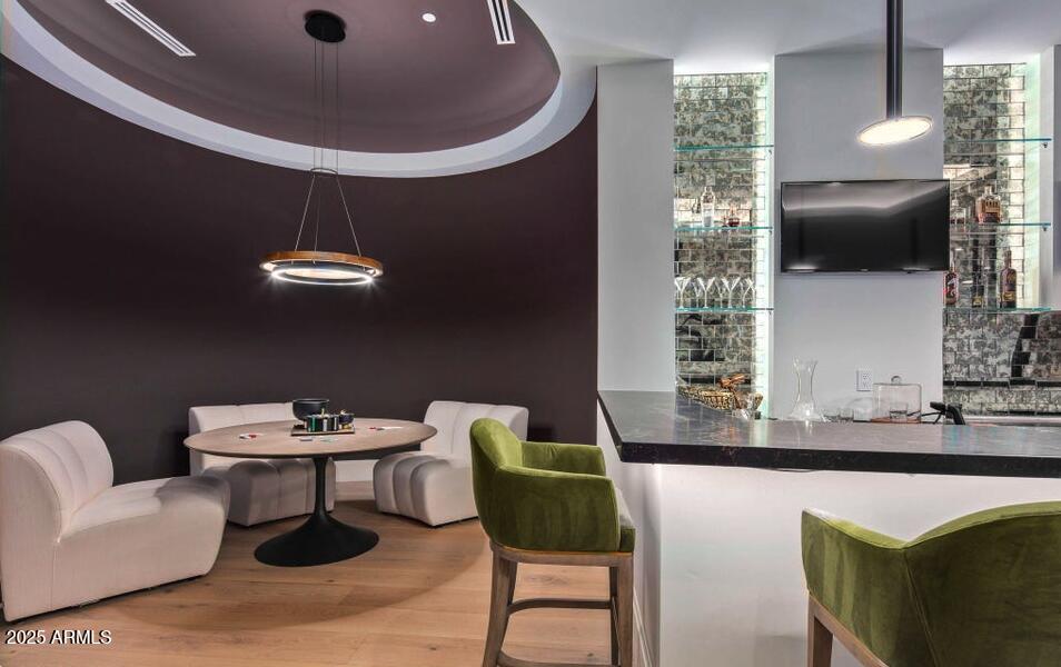 4880 East Lone Mountain Road North Cave Creek, AZ 85331 - Photo 49 of 73 a living room with furniture and a floor to ceiling window