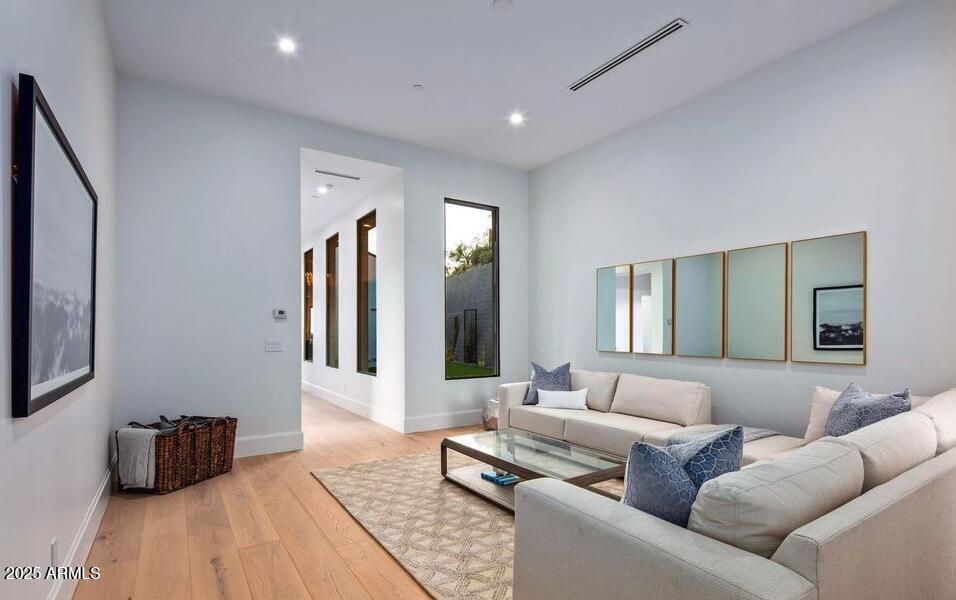 4880 East Lone Mountain Road North Cave Creek, AZ 85331 - Photo 55 of 73 a living room with furniture and a couch