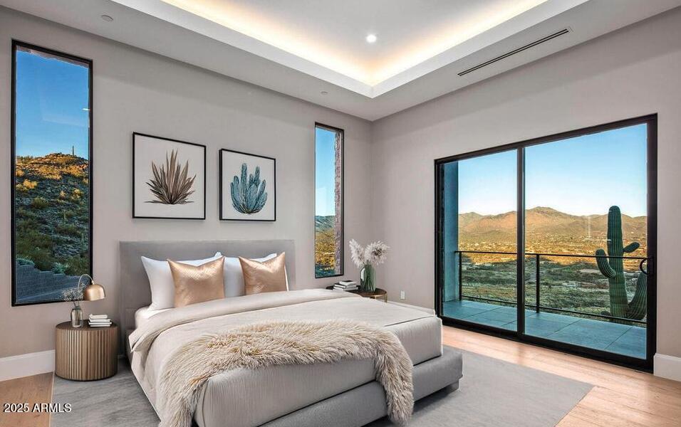 4880 East Lone Mountain Road North Cave Creek, AZ 85331 - Photo 59 of 73 a bedroom with a large bed and a large window