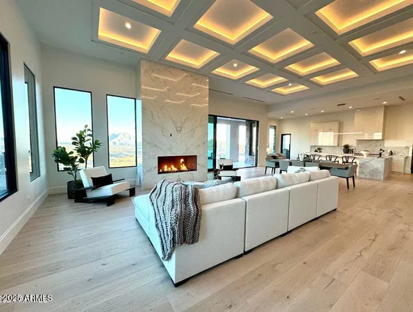 a living room with fireplace furniture and a flat screen tv