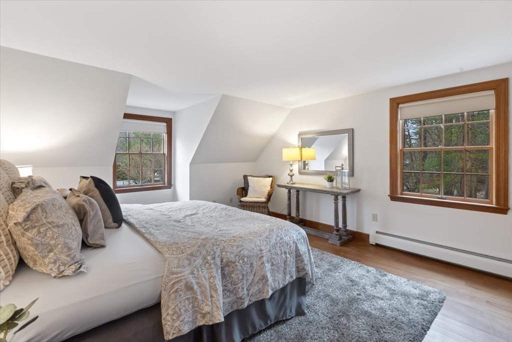 86 Dodges Row Wenham, MA 01984 - Photo 18 of 40 a bedroom with a bed and a window