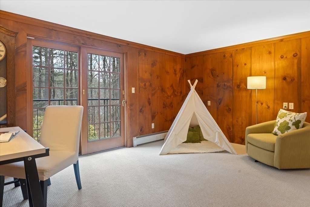 86 Dodges Row Wenham, MA 01984 - Photo 21 of 40 a view of a livingroom with furniture and staircase