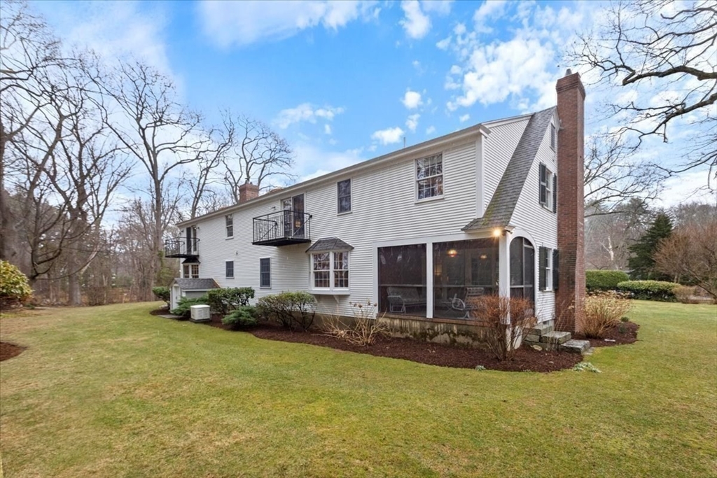 86 Dodges Row Wenham, MA 01984 - Photo 30 of 40 a front view of house with yard and green space