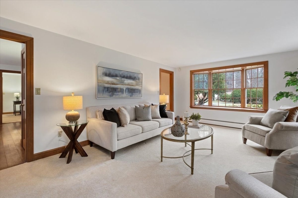 86 Dodges Row Wenham, MA 01984 - Photo 6 of 40 a living room with furniture and a large window